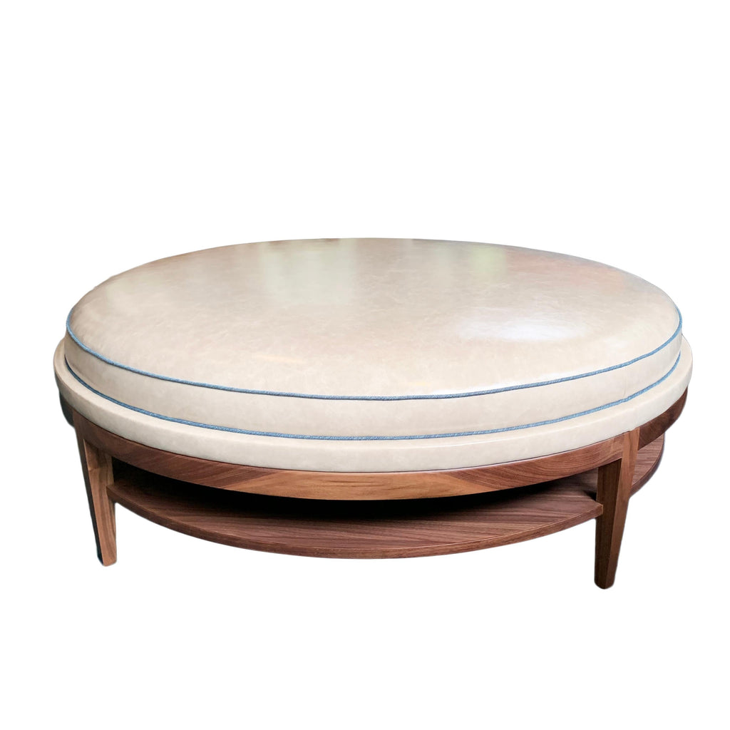 https://a.1stdibscdn.com/round-cushioned-top-coffee-table-with-storage-for-sale-picture-4/f_21233/1582840569822/donatella_ottoman_custom_990_master.jpg