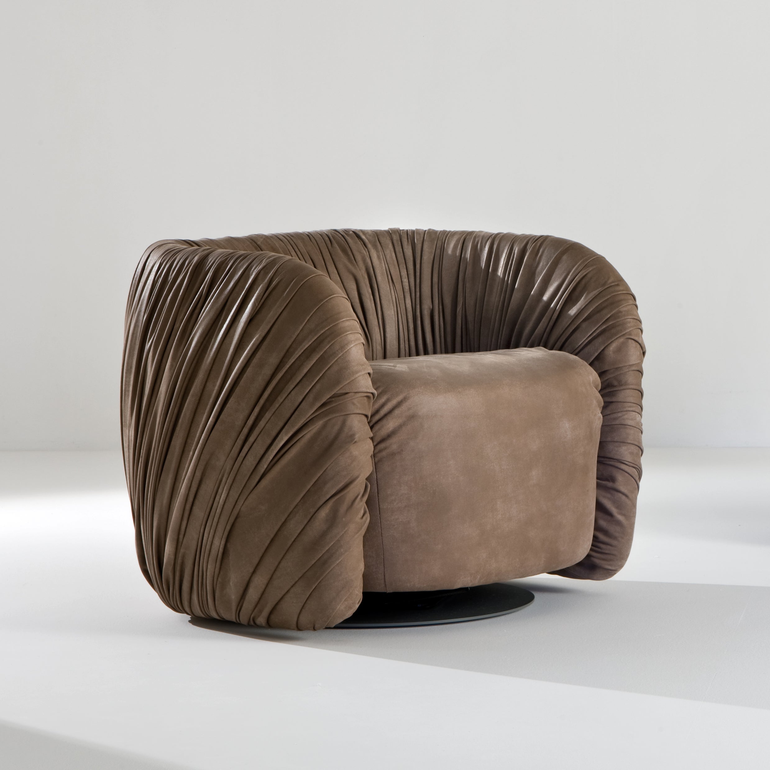 https://a.1stdibscdn.com/laurameroni-drape-lounge-modern-swivel-armchair-in-hand-pleated-leather-for-sale/f_52792/f_192171121774449313833/drapelounge_armchair_drape_laurameroni_00001sq_org.jpg