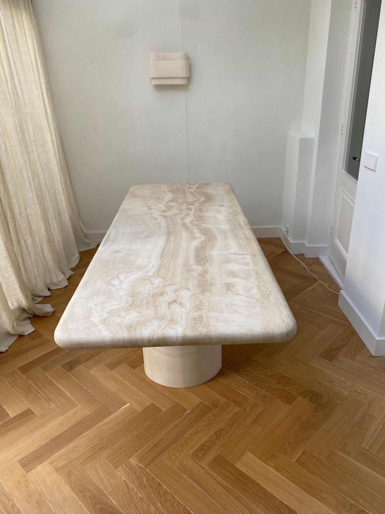 https://a.1stdibscdn.com/large-sculptural-curved-edge-travertine-rectangle-dining-table-for-sale-picture-2/f_80522/f_326937921675972010473/eec66021_beb4_4f02_9bf2_3ad84c6cb4f2_3_master.JPG
