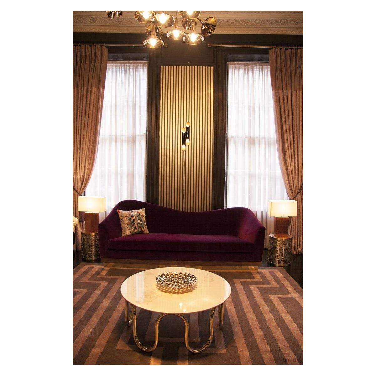 https://a.1stdibscdn.com/sculptural-art-deco-revival-sofa-asymmetrical-silhouette-on-brass-plinth-for-sale-picture-9/f_27693/f_490653921772597870857/ei_master.jpg