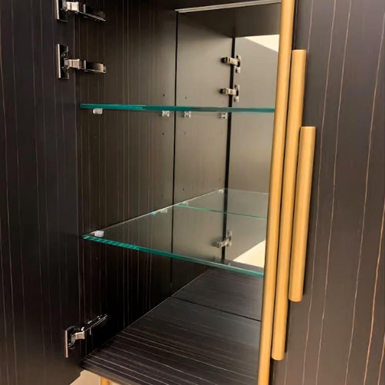 https://a.1stdibscdn.com/contemporary-art-deco-revival-cabinet-in-rectangular-form-by-mondo-design-studio-for-sale-picture-12/f_27693/f_470805521760926461042/eliot_cabinet_by_fci_clearance_4_master.jpg?width=768