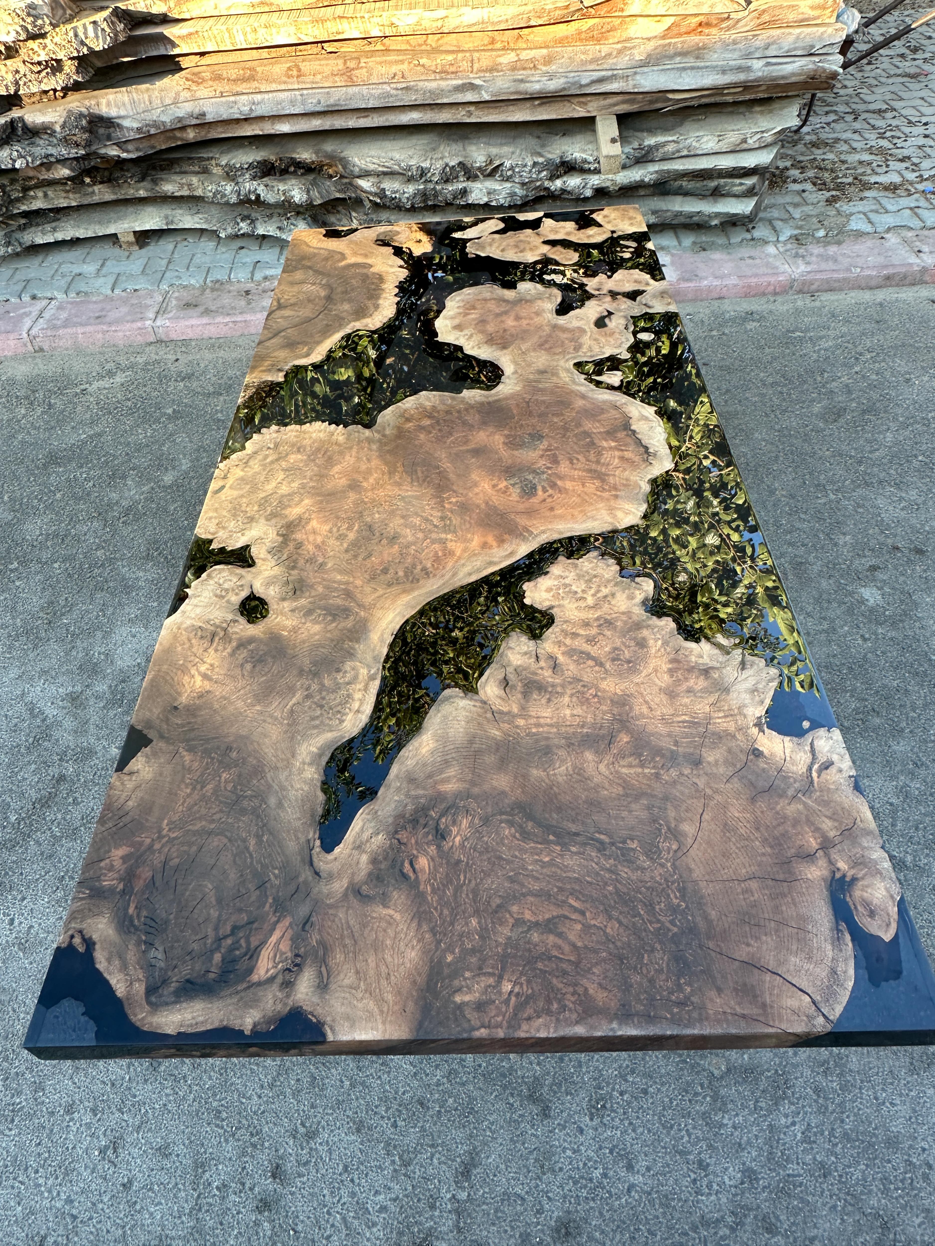 https://a.1stdibscdn.com/oval-dining-table-black-resin-river-root-walnut-wood-table-for-sale-picture-4/f_91932/f_411725421724402442896/epoxy_resin_wood_table_art_handmade_025_master.JPG