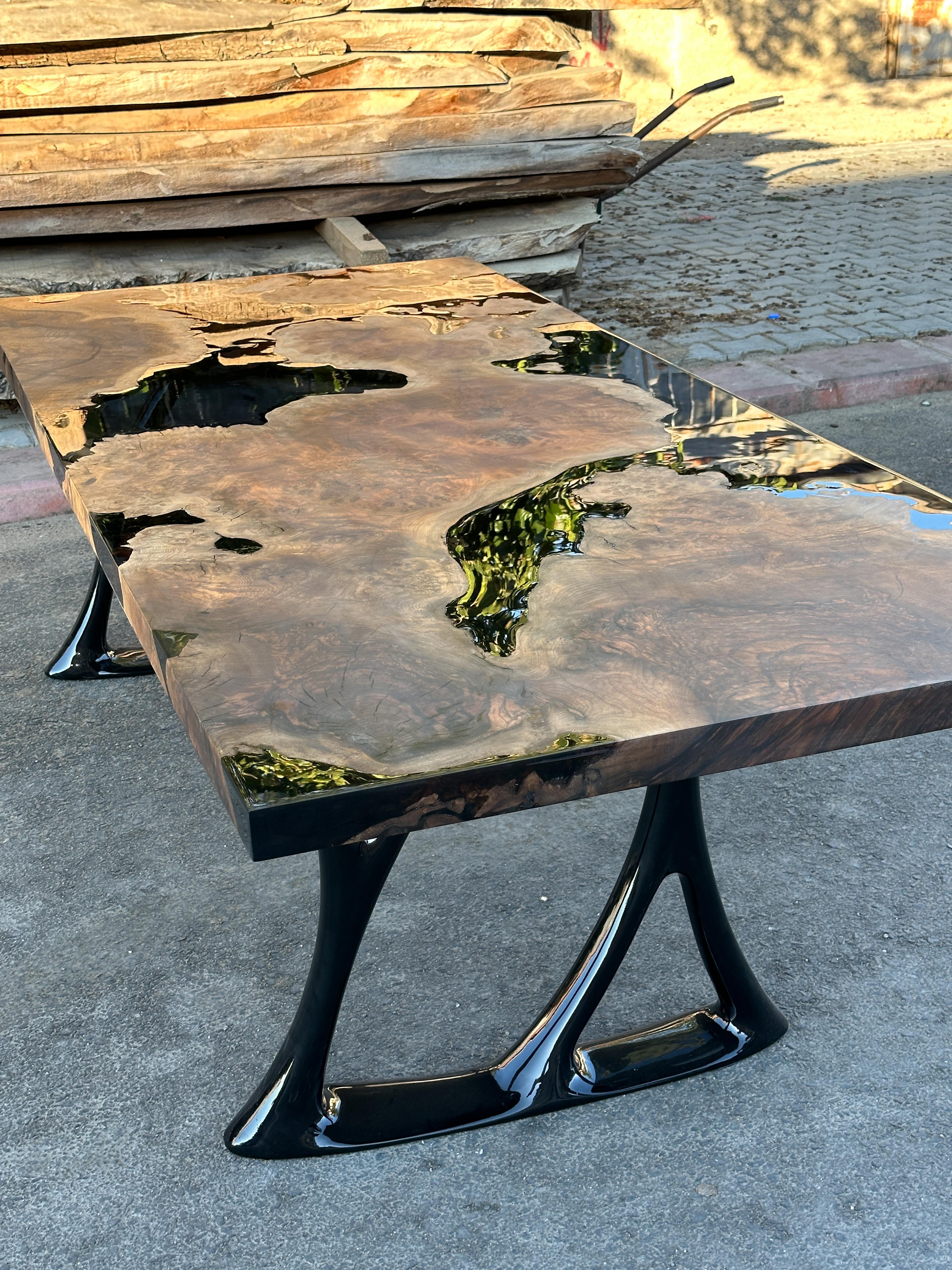 https://a.1stdibscdn.com/oval-dining-table-black-resin-river-root-walnut-wood-table-for-sale-picture-5/f_91932/f_411725421724402441510/epoxy_resin_wood_table_art_handmade_026_master.JPG