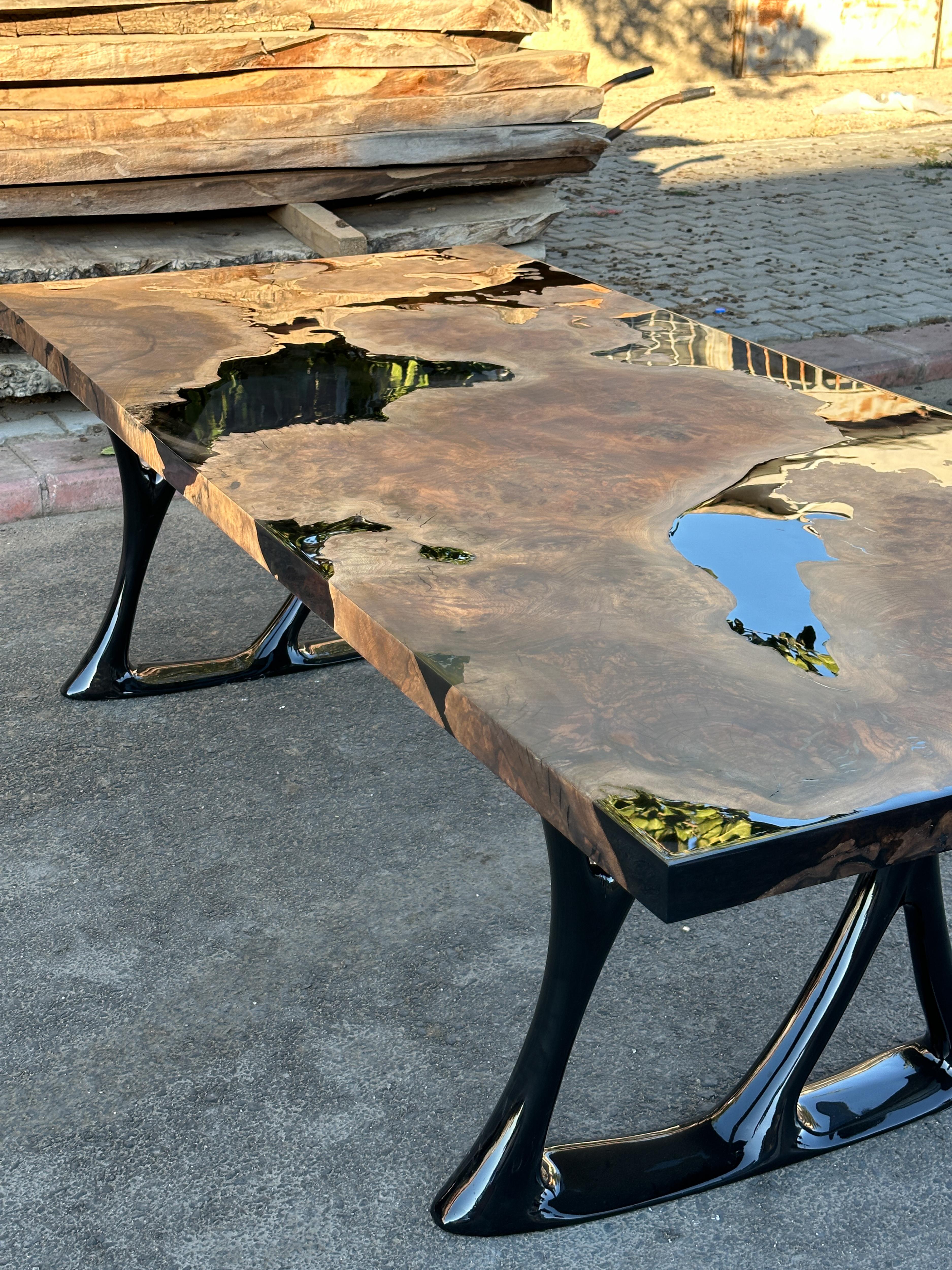 https://a.1stdibscdn.com/oval-dining-table-black-resin-river-root-walnut-wood-table-for-sale-picture-6/f_91932/f_411725421724402441076/epoxy_resin_wood_table_art_handmade_027_master.JPG