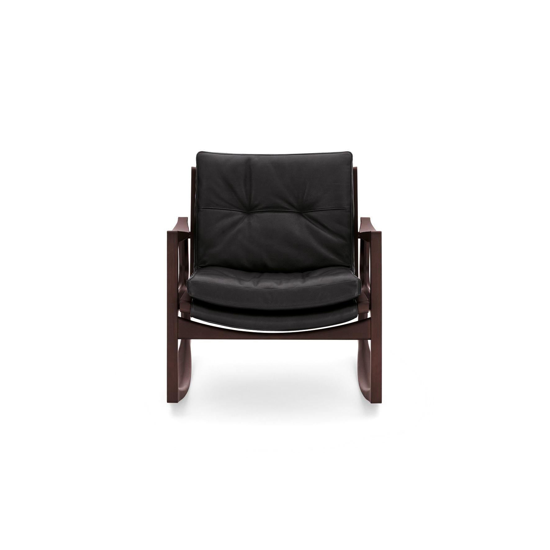 https://a.1stdibscdn.com/classicon-euvira-rocking-chair-in-stained-oak-black-leather-by-jader-almeida-for-sale-picture-2/12330573/f_138501611551429957098/euvira_brown_leather_black_front_master.jpg