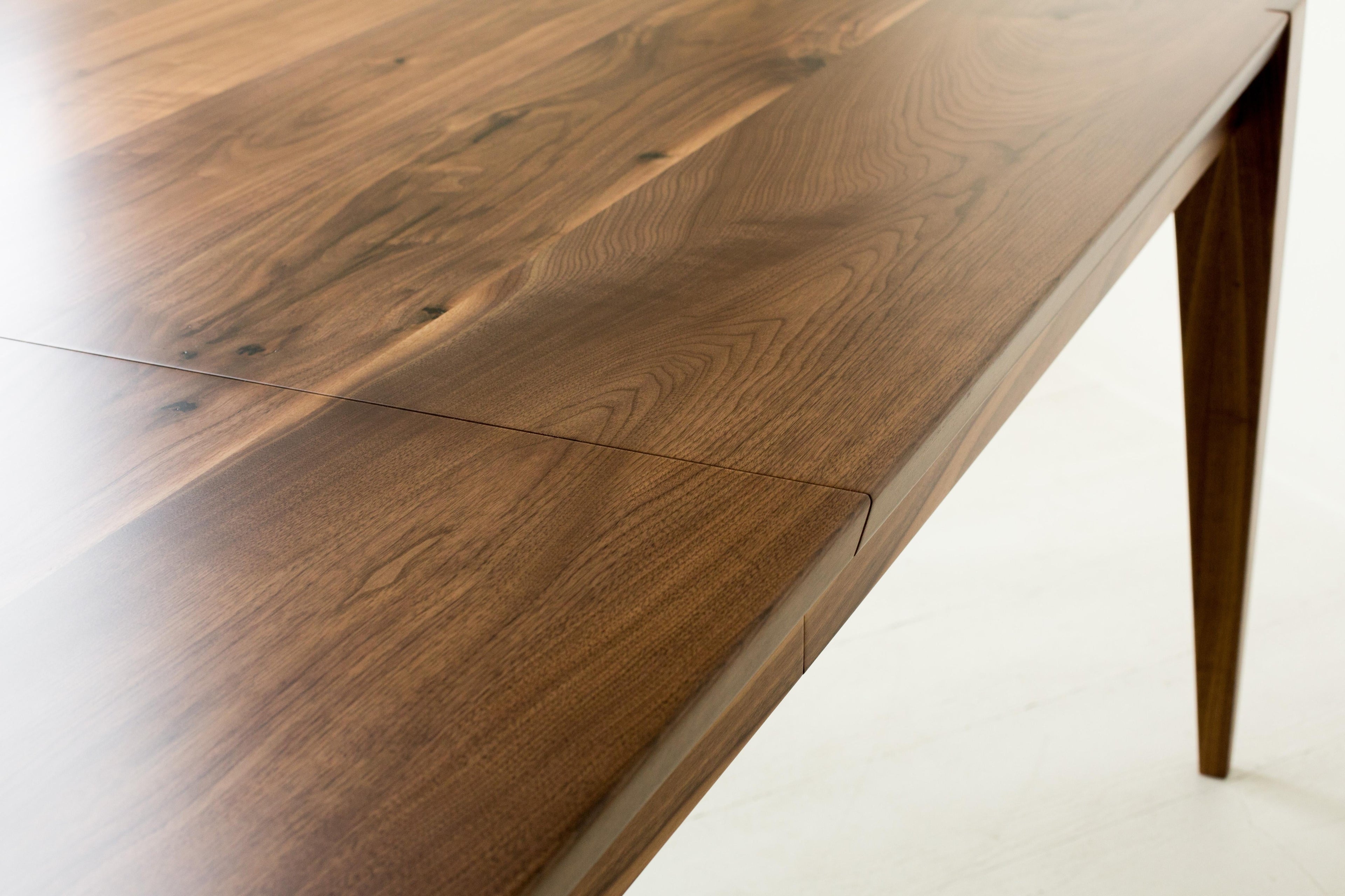 https://a.1stdibscdn.com/oslo-extension-dining-table-in-walnut-by-studio-moe-for-sale-picture-2/f_51932/f_182963821584046944960/extension_table_3_eastern_walnut_best_image_master.jpg