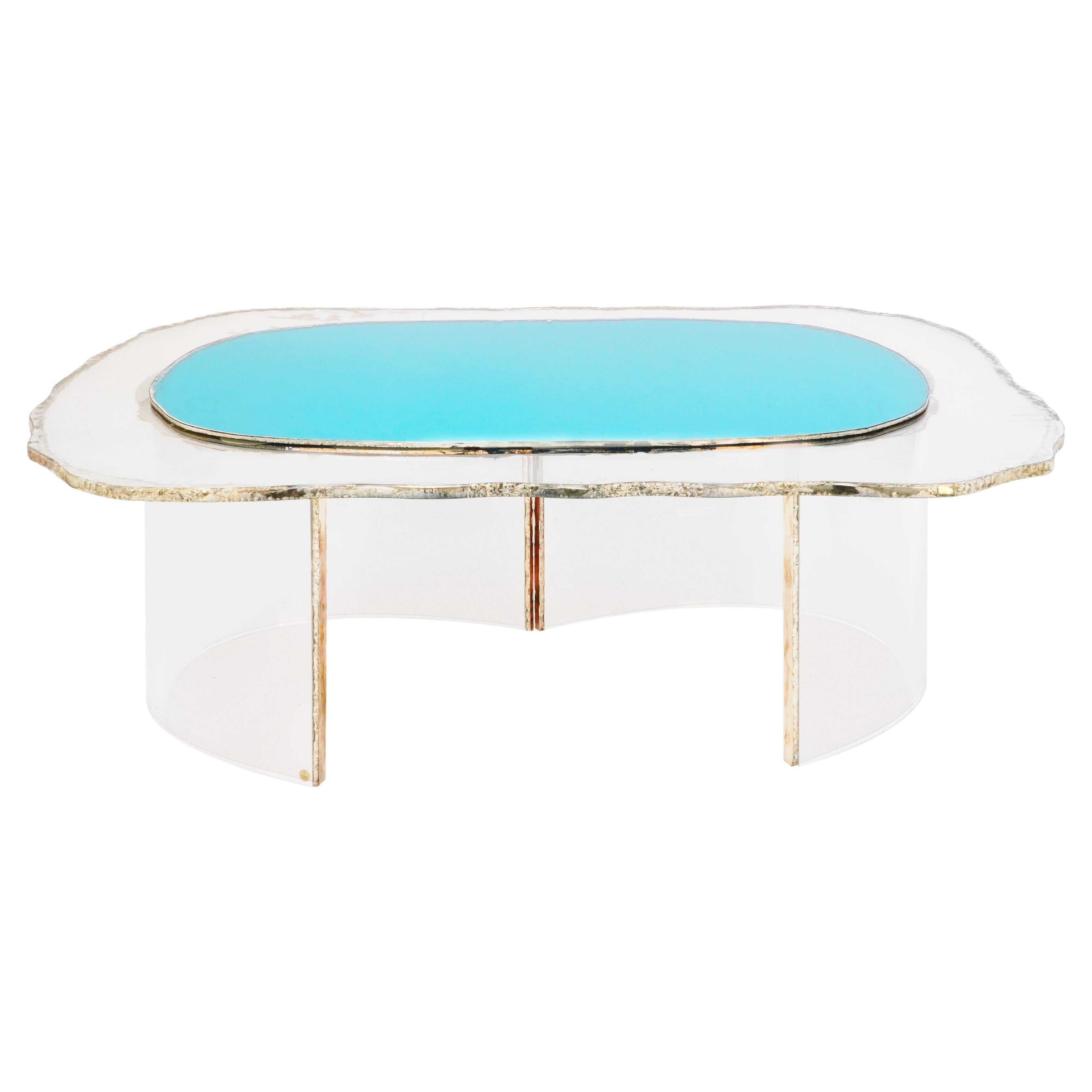 https://a.1stdibscdn.com/gem-contemporary-coffee-table-silvered-acqua-glass-surface-and-transparent-legs-for-sale/f_16022/f_144241411696326174585/f_14424141_1696326175887_bg_processed.jpg