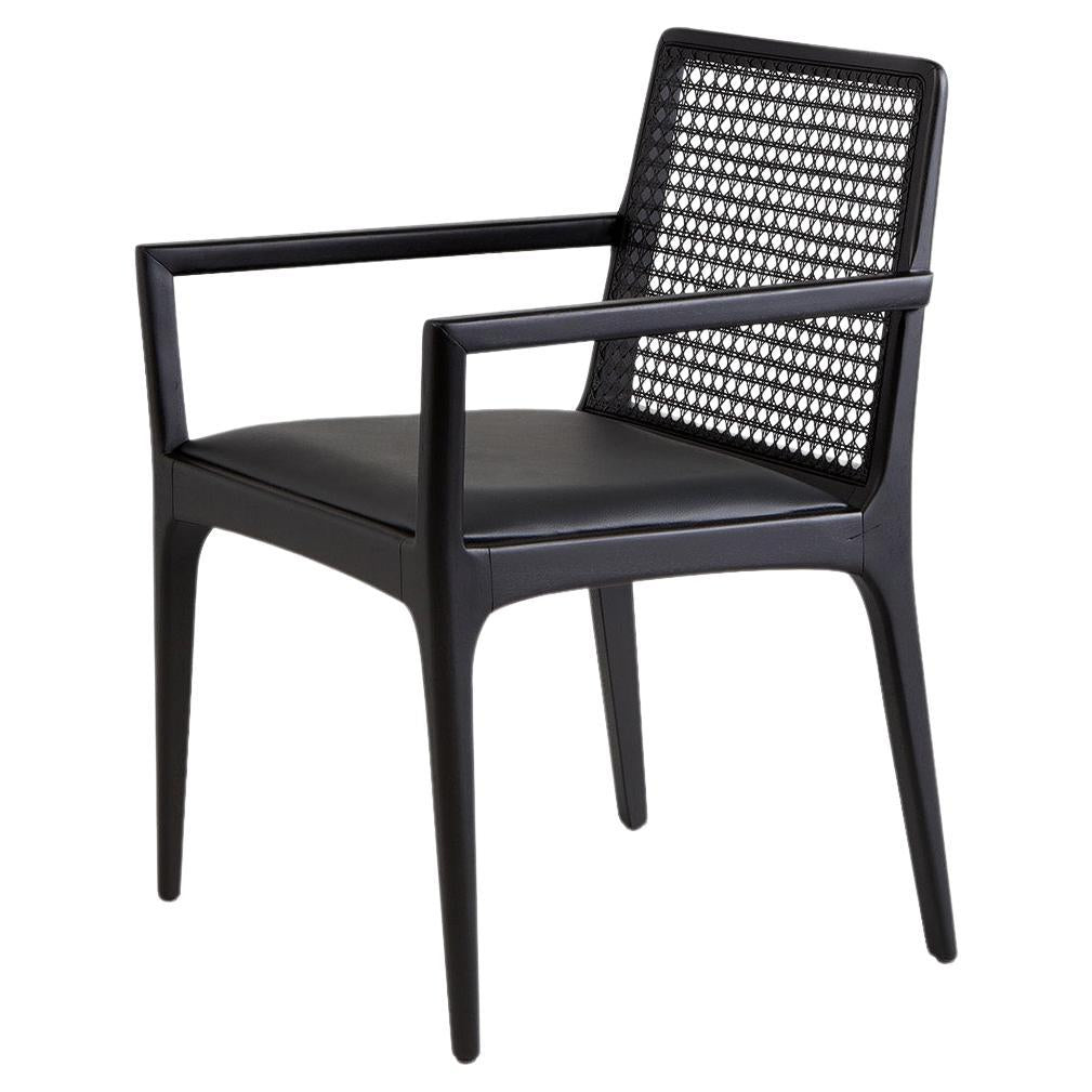 https://a.1stdibscdn.com/julia-chair-with-wooden-arms-in-ebony-for-sale/f_33041/f_150018021641575469758/f_15001802_1641575469992_bg_processed.jpg