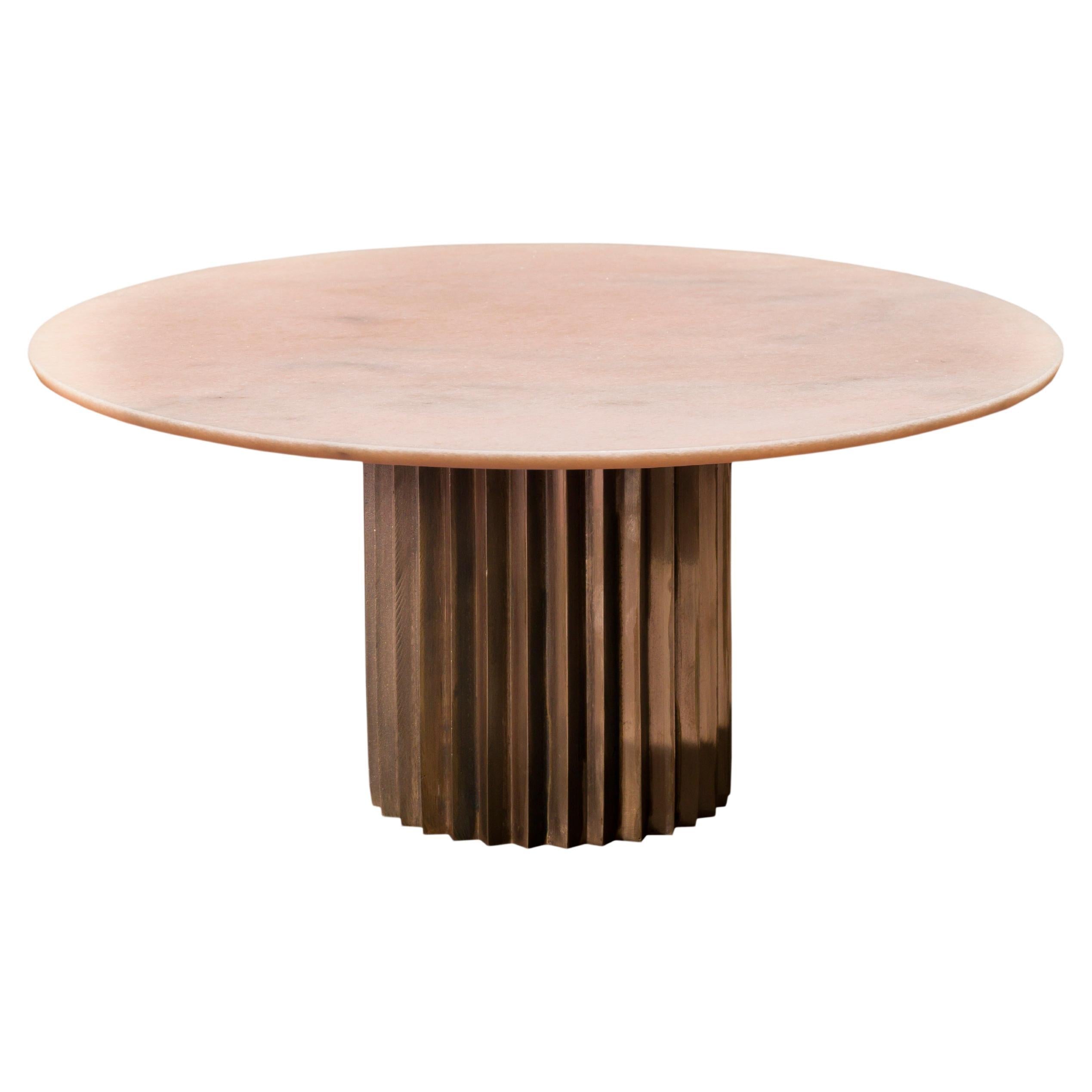 https://a.1stdibscdn.com/doris-round-pedestal-dining-table-in-pink-marble-and-cast-bronze-by-fredjuul-for-sale/f_22063/f_152121121663595187011/f_15212112_1663595187873_bg_processed.jpg