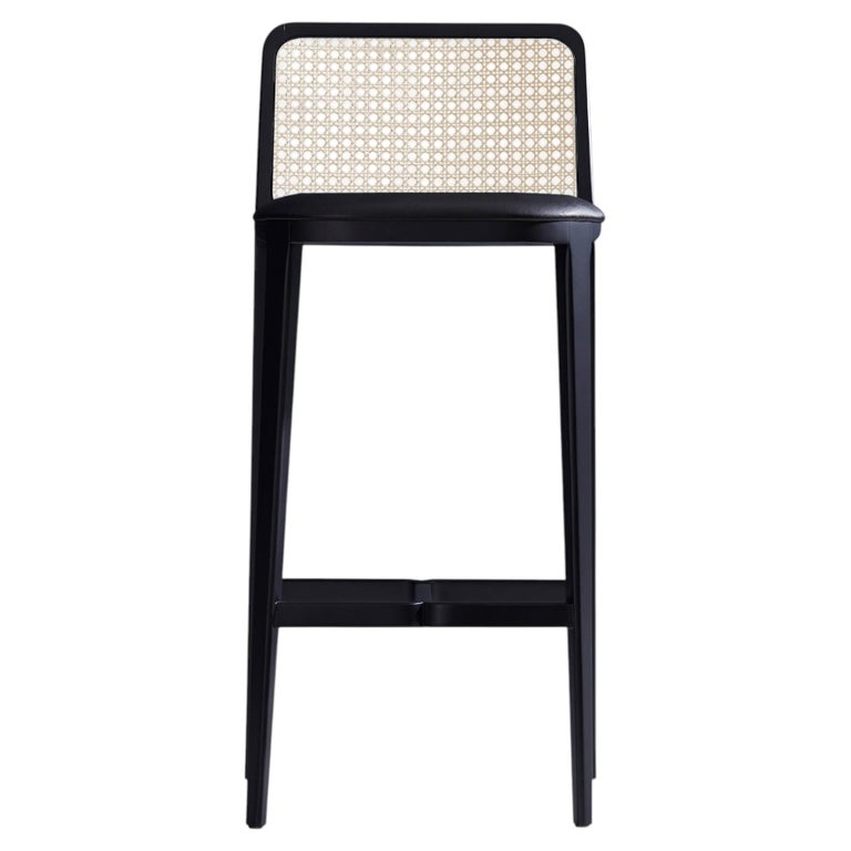 https://a.1stdibscdn.com/solid-wood-stool-by-simonini-black-ebonized-finish-custom-height-for-sale/f_35593/f_191783521775598640362/f_19178352_1775598640468_bg_processed.jpg?width=768