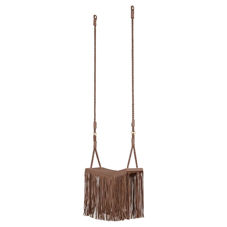 https://a.1stdibscdn.com/revoar-hanging-swing-chair-in-natural-leather-handmade-in-caramel-for-sale/f_56842/f_234752921693834100679/f_23475292_1693834101100_bg_processed.jpg?width=768