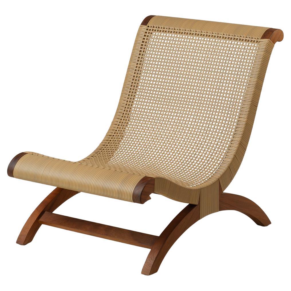 https://a.1stdibscdn.com/tropical-hardwood-and-rattan-butaque-chair-outdoor-use-licensed-reedition-for-sale/f_34063/f_243655221768837878808/f_24365522_1768837879103_bg_processed.jpg