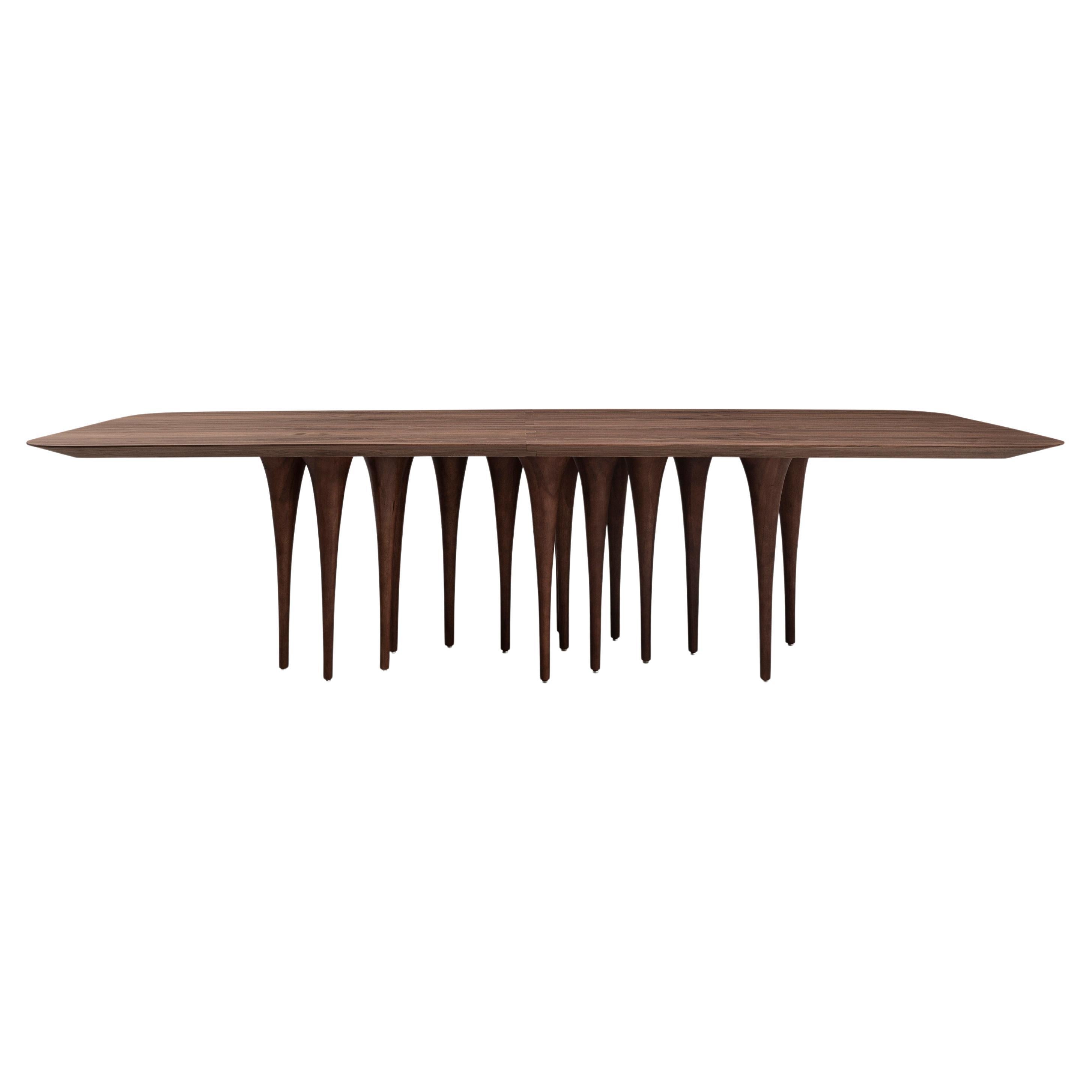 https://a.1stdibscdn.com/dining-room-table-with-veneered-walnut-98-inch-top-and-12-legs-pin-collection-for-sale/f_52822/f_248815121724848600824/f_24881512_1724848601470_bg_processed.jpg