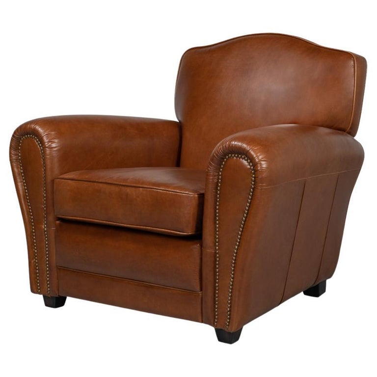 https://a.1stdibscdn.com/french-art-deco-style-club-chair-for-sale/f_8038/f_254710321694451612536/f_25471032_1694451612852_bg_processed.jpg?width=768
