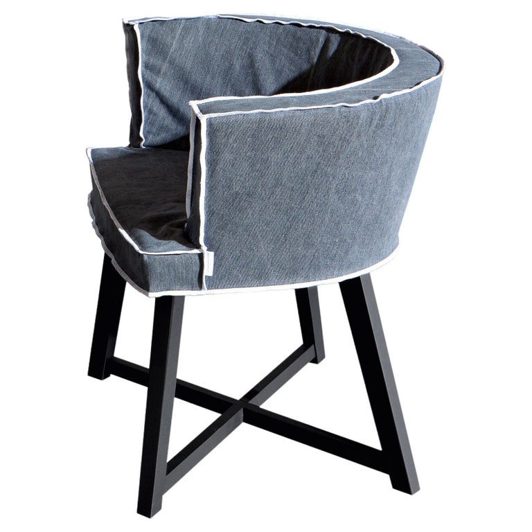 https://a.1stdibscdn.com/gervasoni-gray-26-armchair-with-black-oak-legs-munch-upholstery-paola-navone-for-sale/22569652/f_255882021633407950909/f_25588202_1633407951457_bg_processed.jpg?width=768