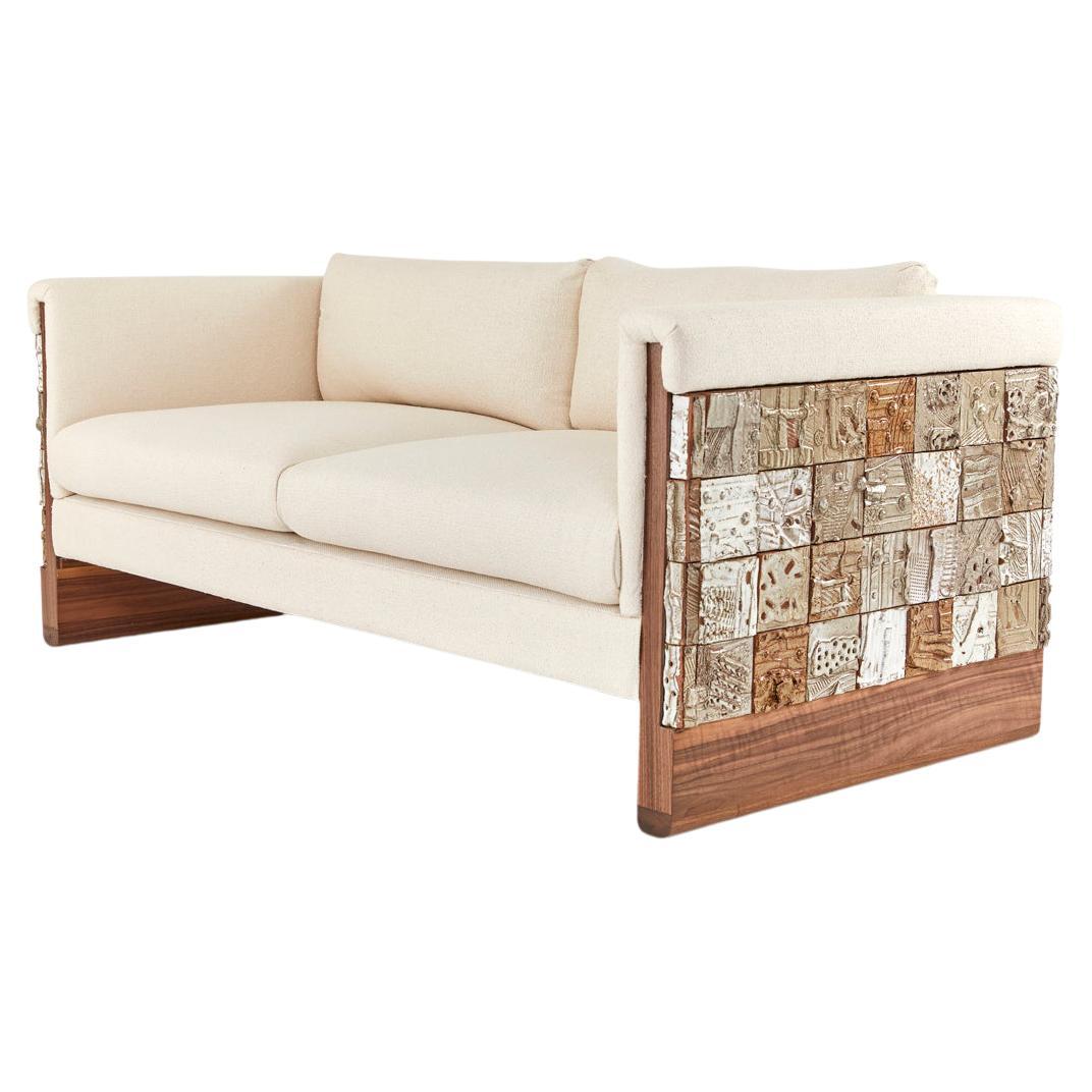 https://a.1stdibscdn.com/stellar-modern-handmade-ceramic-walnut-boucle-upholstered-luxury-sofa-for-sale/f_38931/f_256571221633877393804/f_25657122_1633877394135_bg_processed.jpg