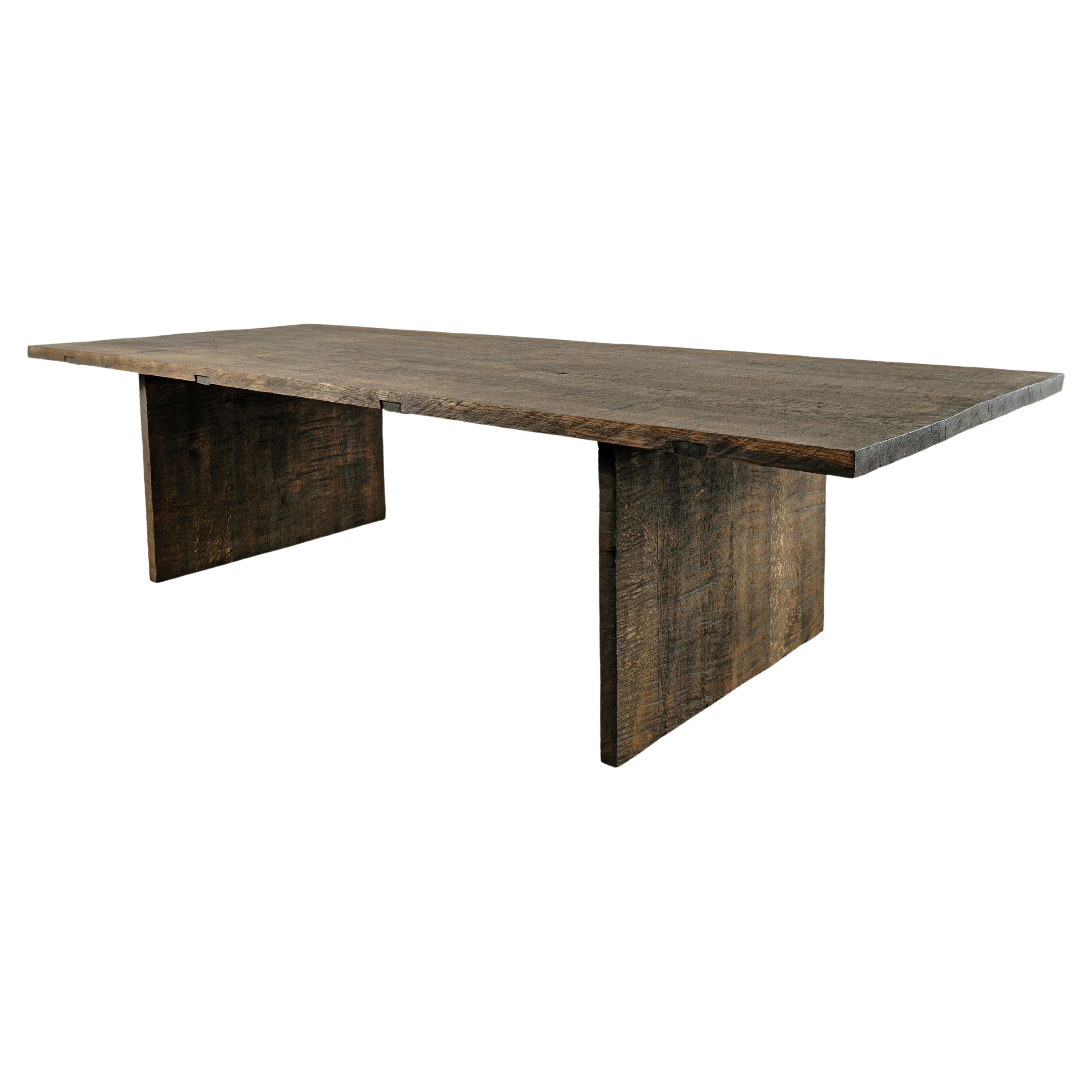 https://a.1stdibscdn.com/sculpted-dining-table-simple-dark-in-solid-oakwood-custom-size-m-for-sale/f_31233/f_257806721634736135836/f_25780622_1634736014899_bg_processed.jpg