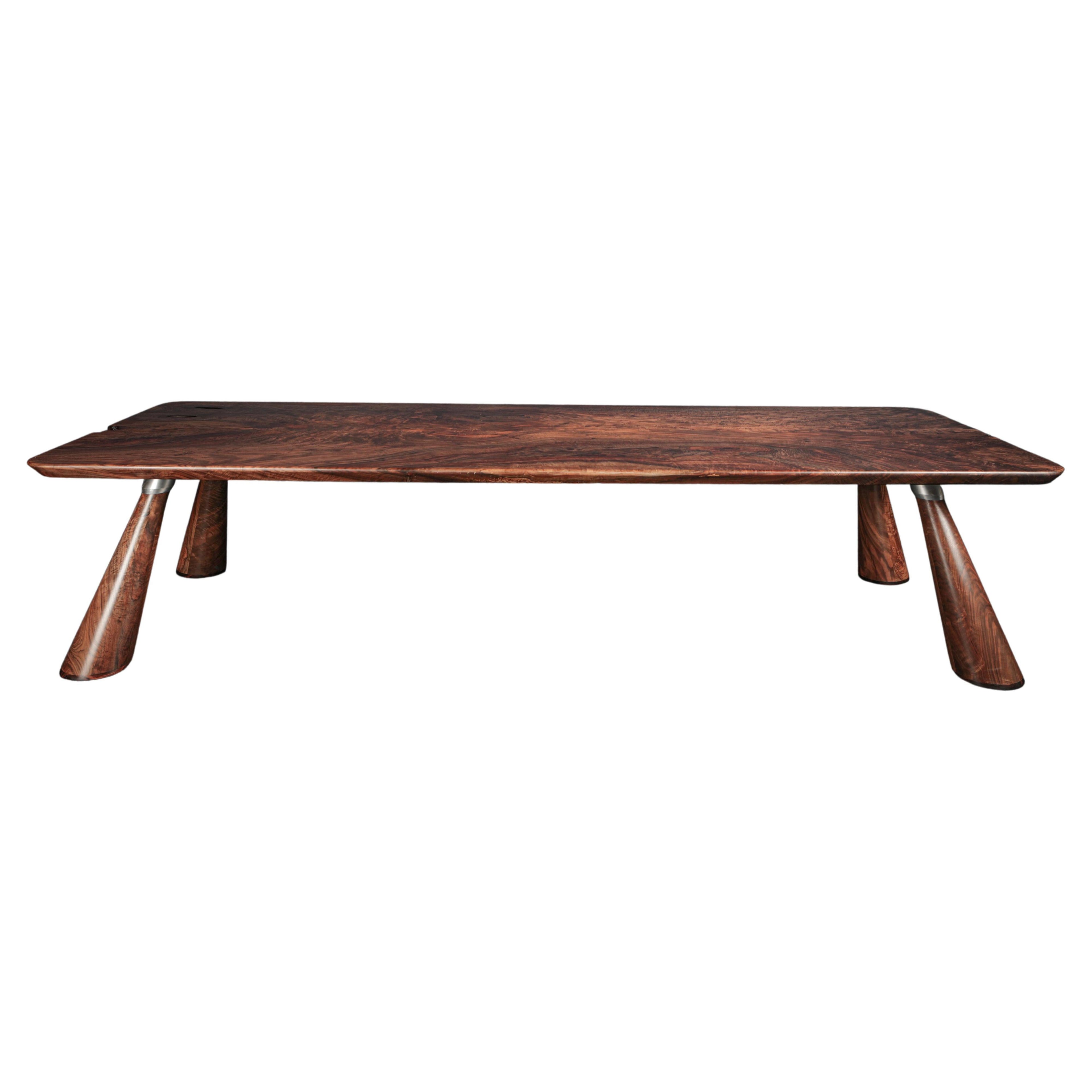 https://a.1stdibscdn.com/bastogne-walnut-single-slab-fijn-dining-table-in-stock-for-sale/f_51472/f_262199321642114935204/f_26219932_1642114936432_bg_processed.jpg