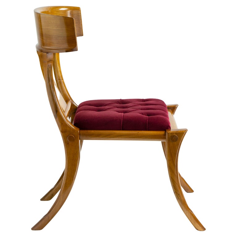 https://a.1stdibscdn.com/klismos-walnut-wood-saber-legs-customizable-red-velvet-seats-dining-chairs-for-sale/22569652/f_262559121637745717120/f_26255912_1637745718212_bg_processed.jpg?width=768