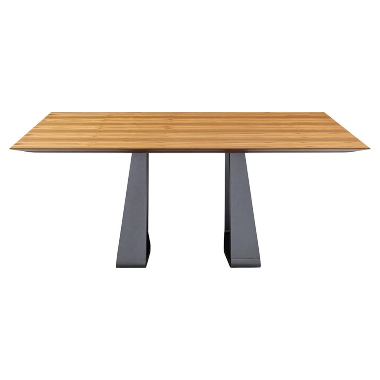 https://a.1stdibscdn.com/wing-67-dining-table-with-chamfered-teak-veneered-top-and-graphite-painted-base-for-sale/f_52822/f_264814921639158335722/f_26481492_1639158336403_bg_processed.jpg?width=768