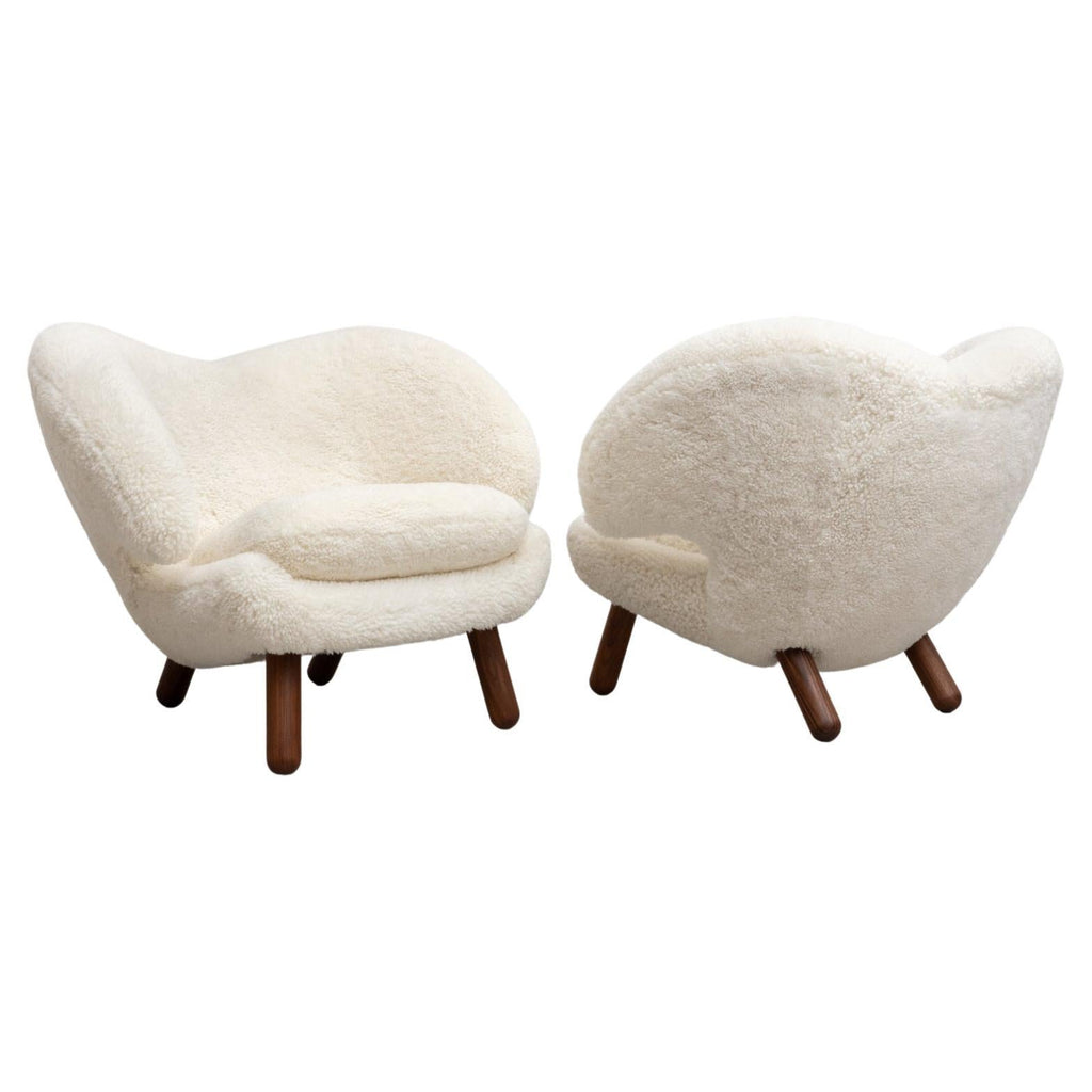 https://a.1stdibscdn.com/set-of-two-finn-juhl-pelican-chair-upholstered-in-gotland-sheepskin-for-sale/f_14272/f_265775721639735404735/f_26577572_1639735405117_bg_processed.jpg