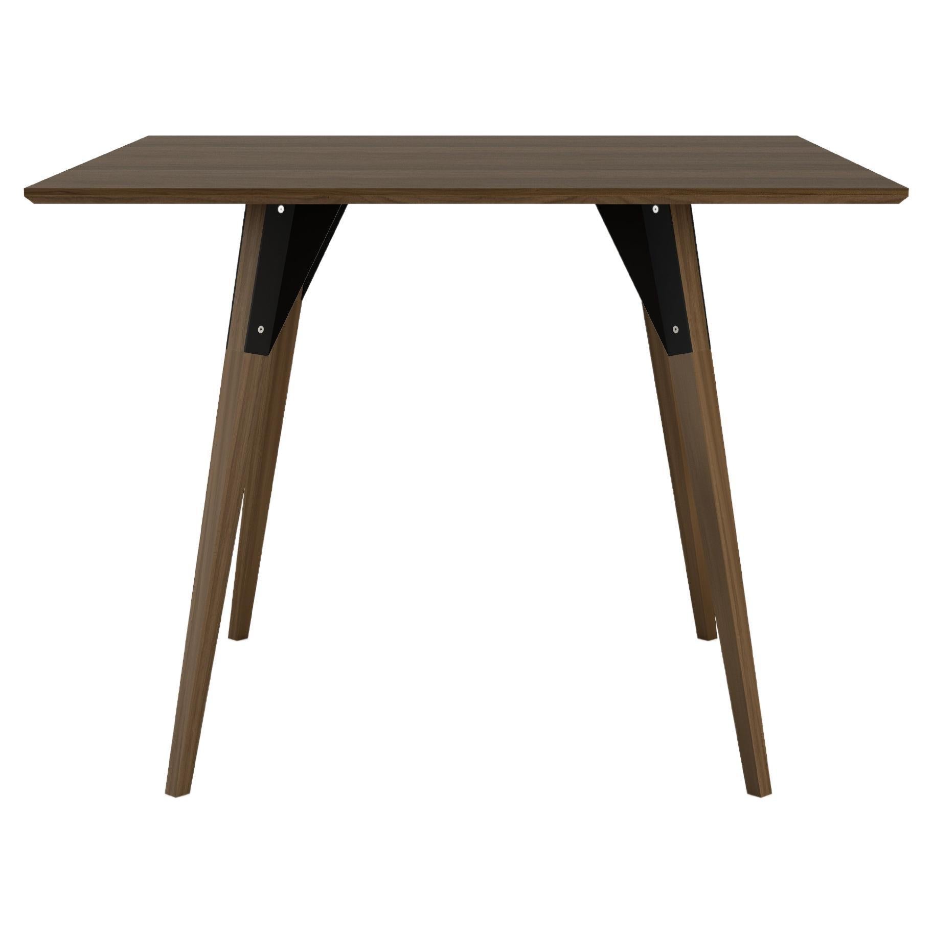 https://a.1stdibscdn.com/clarke-industrial-square-table-walnut-black-for-sale/22569652/f_266193421640006471192/f_26619342_1640006471571_bg_processed.jpg