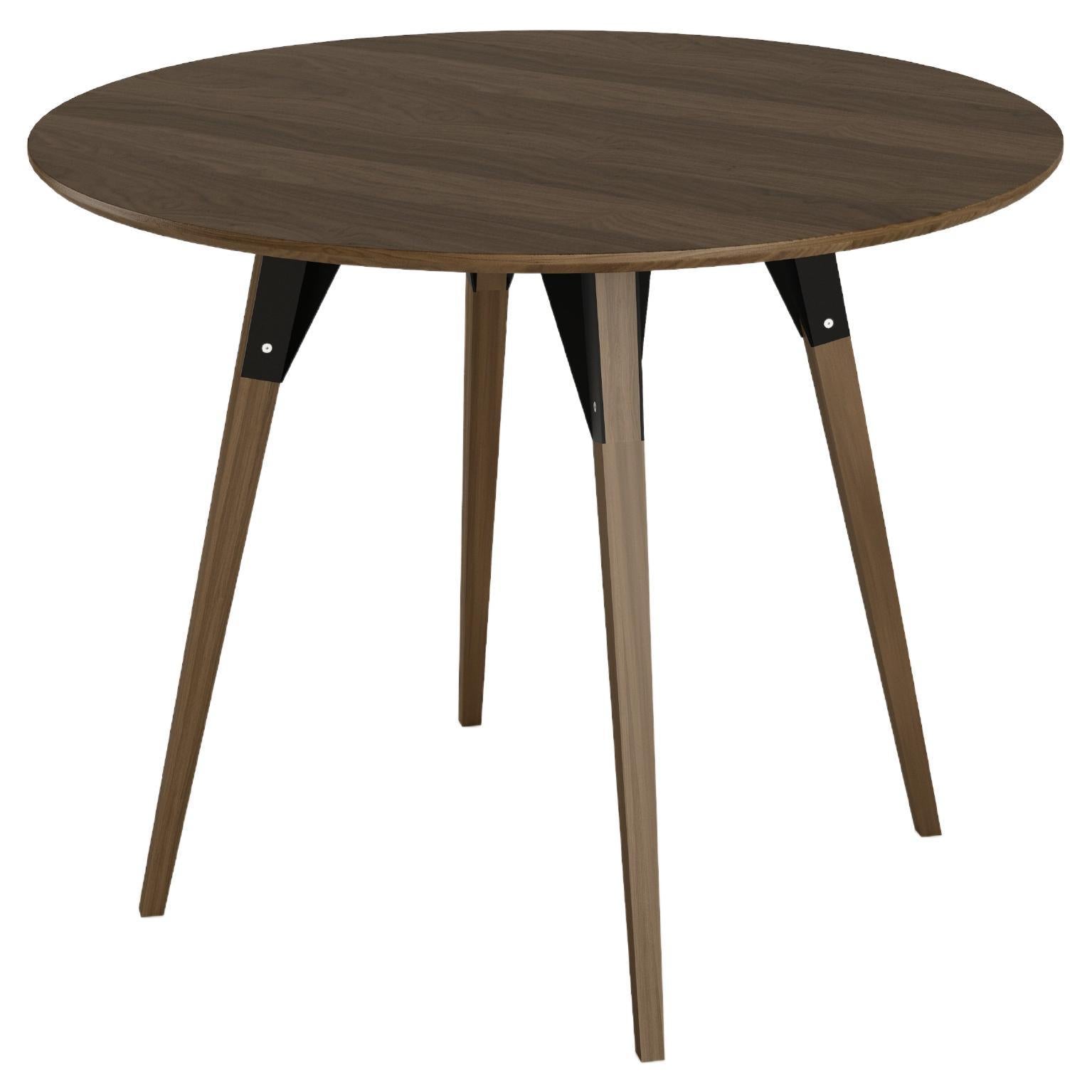 https://a.1stdibscdn.com/clarke-industrial-round-table-walnut-black-for-sale/22569652/f_266197821640007947525/f_26619782_1640007947815_bg_processed.jpg