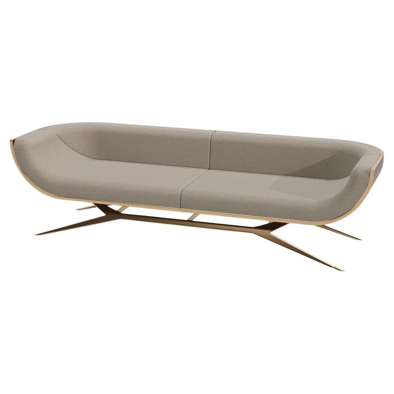 https://a.1stdibscdn.com/21st-century-modern-curved-back-three-seater-sofa-ironwood-brass-gold-finish-for-sale/f_61182/f_267546621675178567814/f_26754662_1675178568082_bg_processed.jpg?width=768