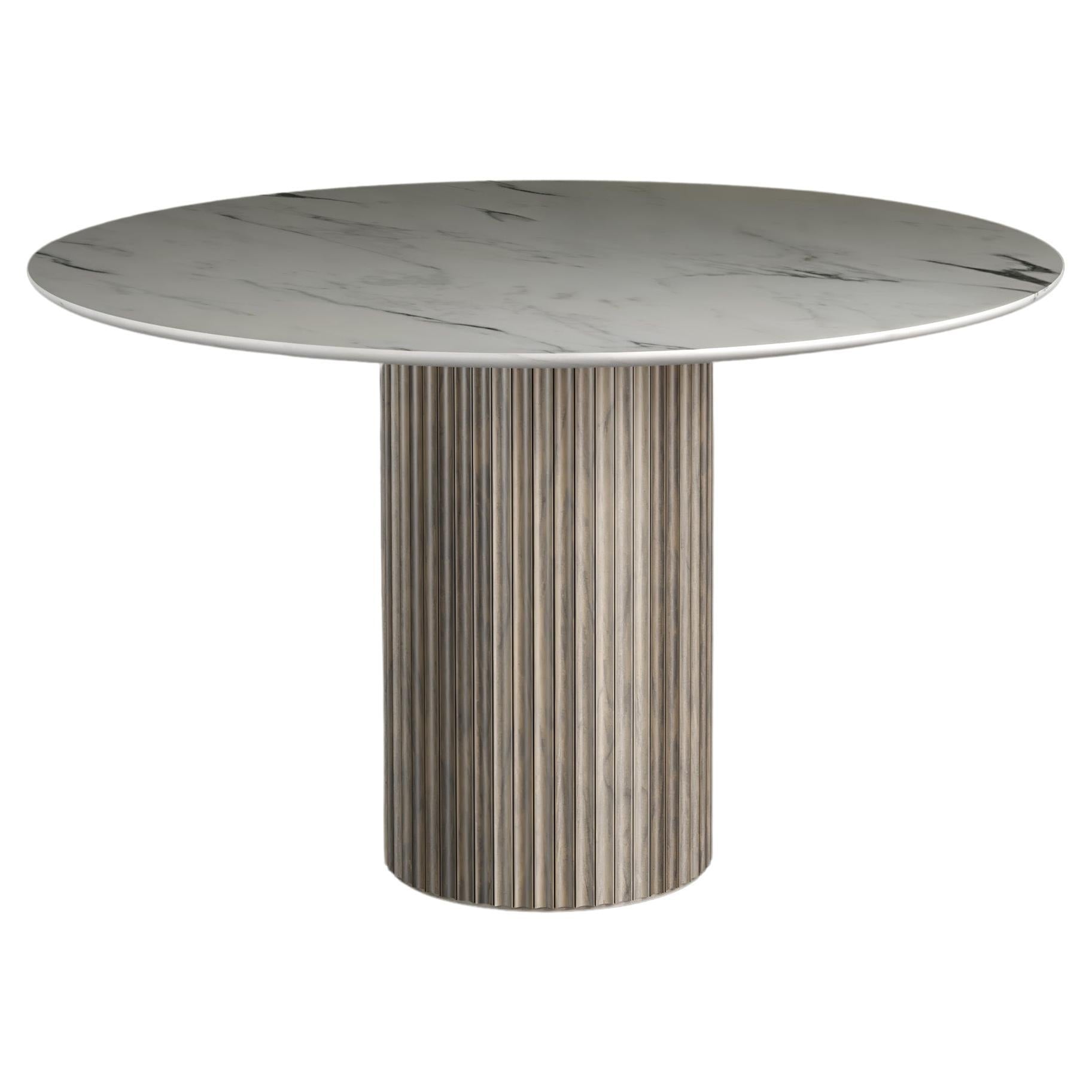 https://a.1stdibscdn.com/fluted-entryway-table-in-solid-wood-pilar-round-dining-table-by-indo--for-sale/f_61162/f_270358221648504266062/f_27035822_1648504266474_bg_processed.jpg
