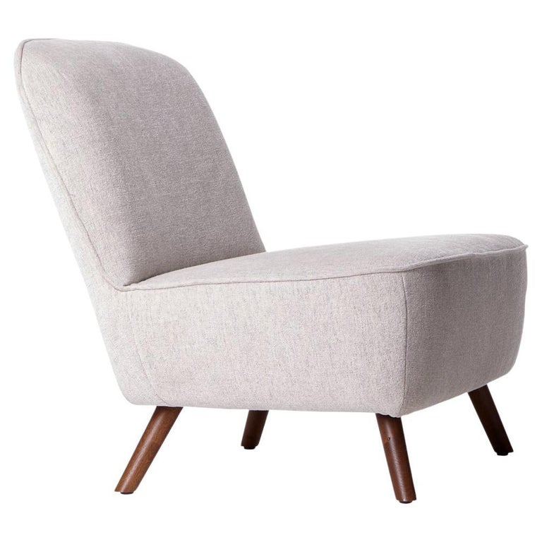 https://a.1stdibscdn.com/moooi-cocktail-chair-in-liscio-nebbia-upholstery-cinnamon-stained-legs-for-sale/22569652/f_271086121643351973306/f_27108612_1643351973531_bg_processed.jpg?width=768