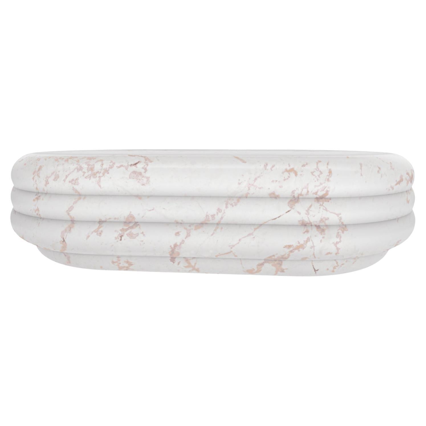 https://a.1stdibscdn.com/chloe-curvy-oval-coffee-table-in-sculpted-pink-portugal-marble-for-sale/f_22063/f_273279521644586866468/f_27327952_1644586866833_bg_processed.jpg