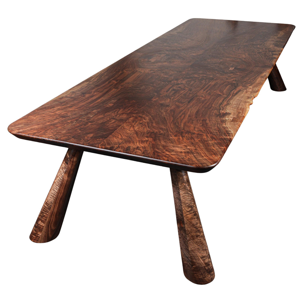 https://a.1stdibscdn.com/claro-walnut-bookmatched-fijn-dining-table-in-stock-for-sale/f_51472/f_274761621645482358299/f_27476162_1645482359705_bg_processed.jpg