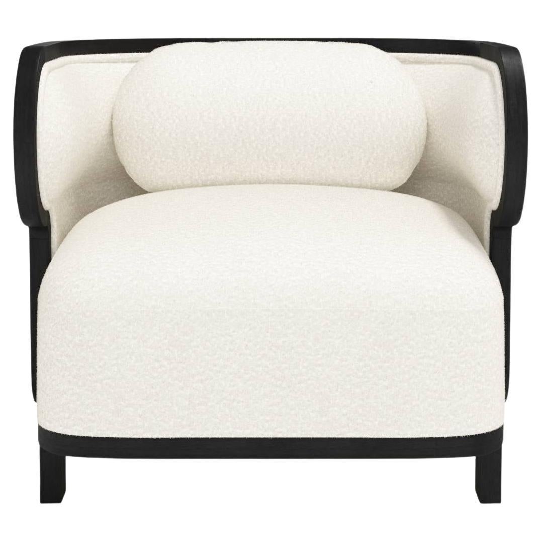 https://a.1stdibscdn.com/odette-curvy-club-chair-with-black-oak-wood-frame-by-fredjuul-for-sale/f_22063/f_274861321683811397753/f_27486132_1683811398078_bg_processed.jpg