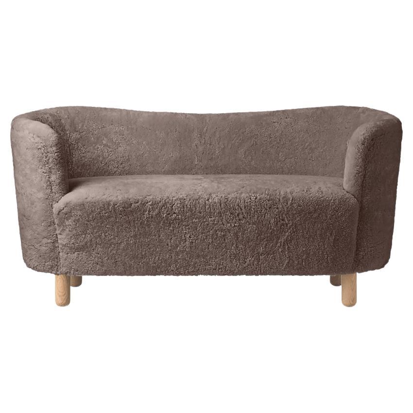 https://a.1stdibscdn.com/sahara-sheepskin-and-natural-oak-mingle-sofa-by-lassen-for-sale/f_12192/f_329172921677087131711/f_27805112_1647369833044_bg_processed.jpg