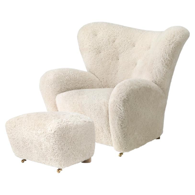 https://a.1stdibscdn.com/set-of-off-white-sheepskin-the-tired-man-lounge-chair-and-footstool-by-lassen-for-sale/f_12192/f_329309121677158774432/f_27970552_1648327595419_bg_processed.jpg