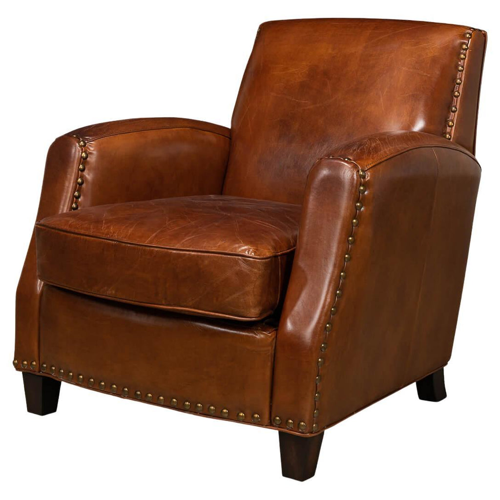 https://a.1stdibscdn.com/classic-leather-armchair-for-sale/f_8038/f_281312921649286772578/f_28131292_1649286772906_bg_processed.jpg