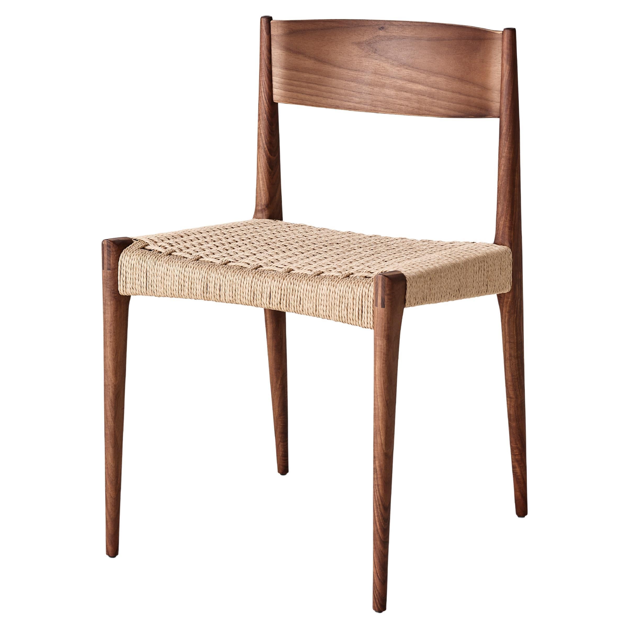 https://a.1stdibscdn.com/pia-chair-by-poul-cadovius-walnut-for-sale/f_31233/f_282341421649941437551/f_28234142_1649941438412_bg_processed.jpg