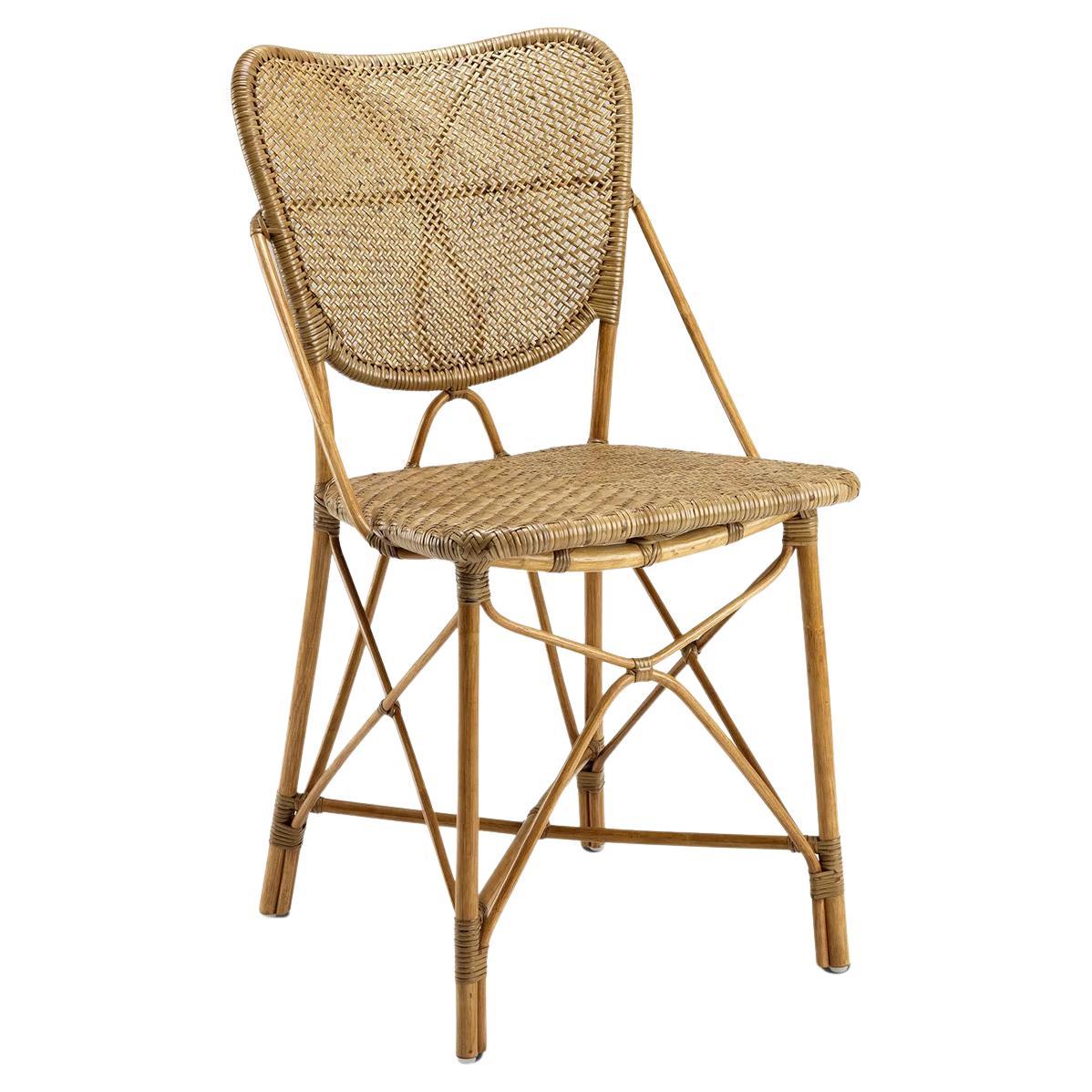 https://a.1stdibscdn.com/rattan-style-chair-for-sale/f_14282/f_282425521649974319057/f_28242552_1649974319475_bg_processed.jpg