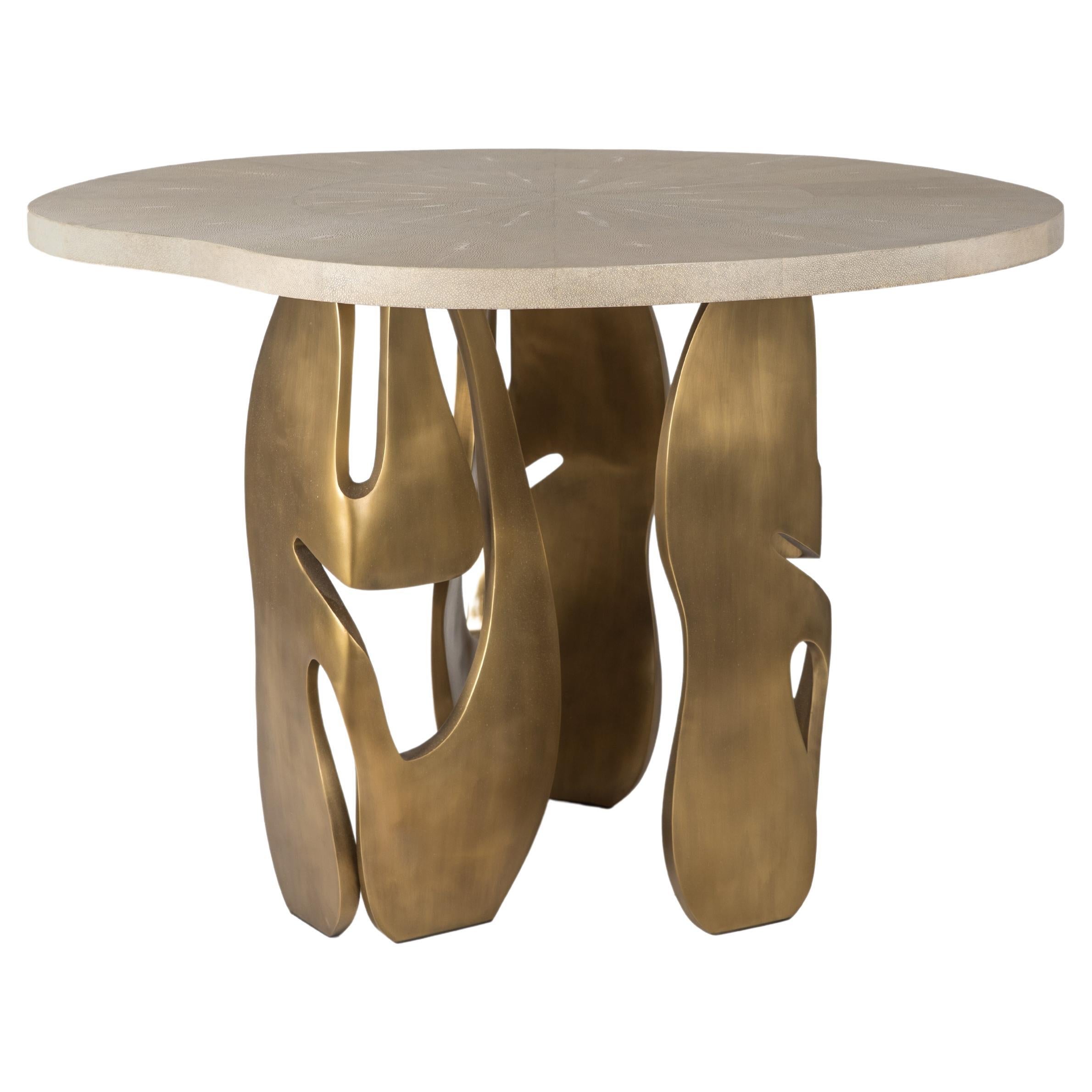 https://a.1stdibscdn.com/shagreen-breakfast-table-with-sculptural-brass-legs-by-r-y-augousti-for-sale/f_45491/f_284092521651027124824/f_28409252_1651027125771_bg_processed.jpg