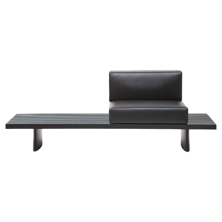 https://a.1stdibscdn.com/charlotte-perriand-refolo-modular-sofa-wood-and-black-leather-by-cassina-for-sale/f_14272/f_393756321713775502415/f_28429832_1651142787292_bg_processed.jpg?width=768