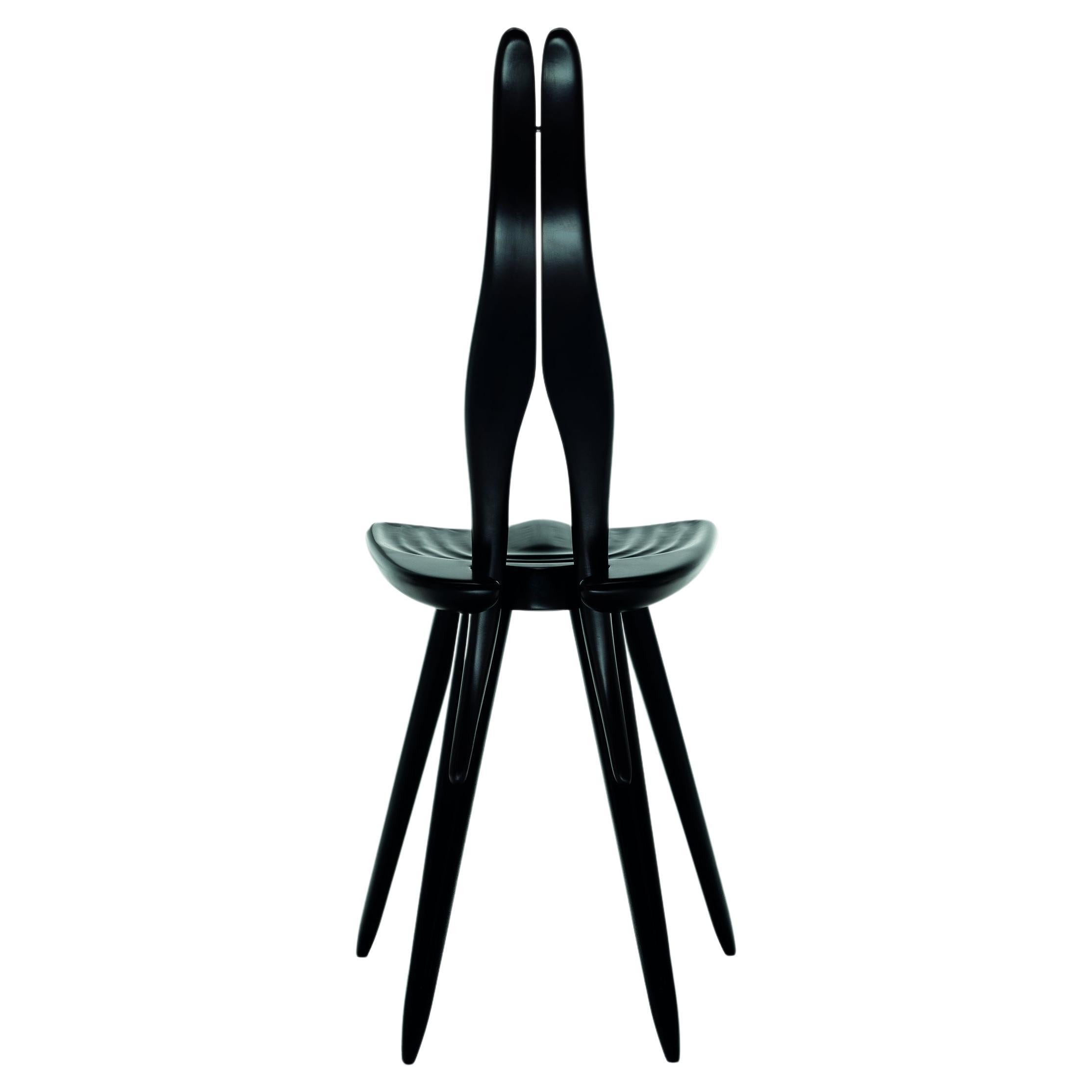 https://a.1stdibscdn.com/zanotta-fenis-cm-chair-in-black-frame-by-carlo-mollino-for-sale/22569652/f_284812221651487561959/f_28481222_1651487562460_bg_processed.jpg