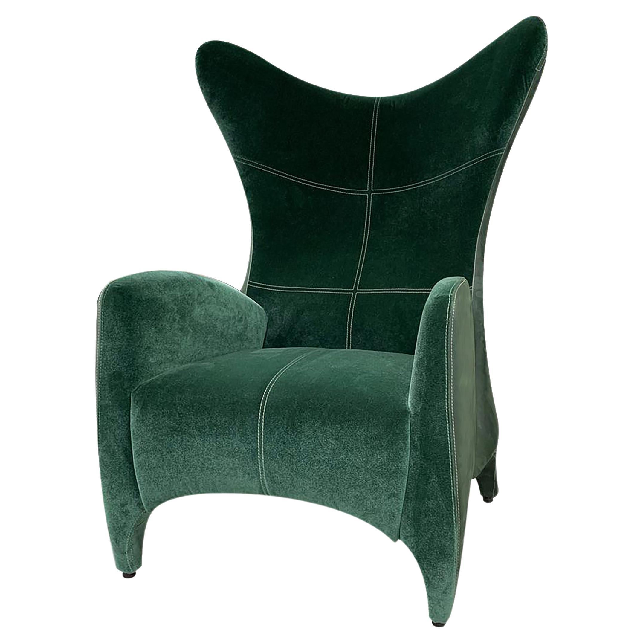 https://a.1stdibscdn.com/modern-wing-chair-upholstered-in-emerald-green-velvet-for-sale/f_65442/f_285325421651759128725/f_28532542_1651759129619_bg_processed.jpg