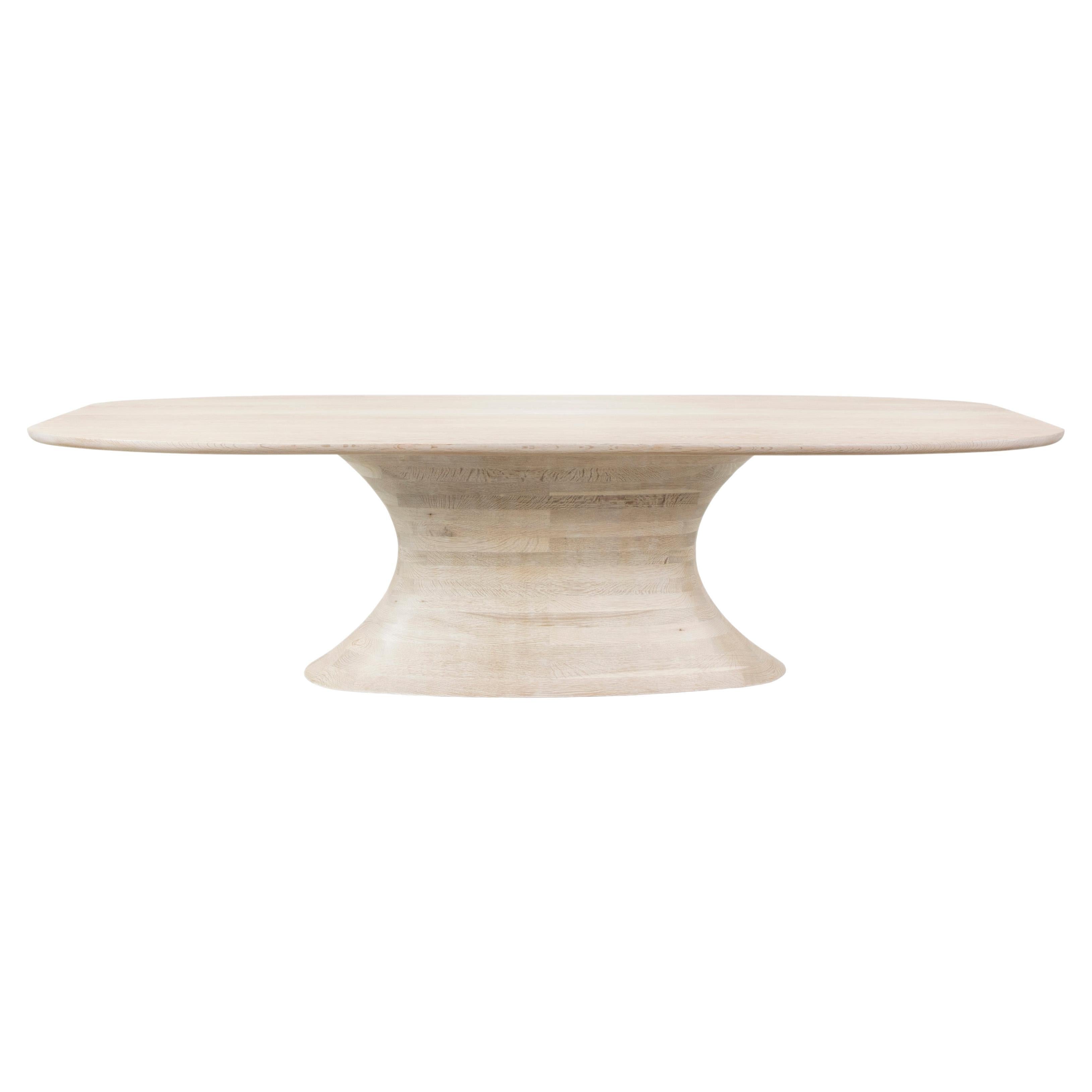 https://a.1stdibscdn.com/concave-statement-dining-table-in-white-oak-for-sale/f_28803/f_285518521651851774995/f_28551852_1651851776078_bg_processed.jpg