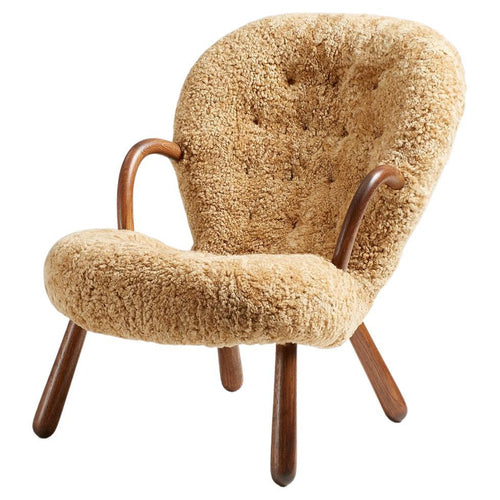 https://a.1stdibscdn.com/re-edition-sheepskin-clam-chairs-by-arnold-madsen-for-sale/f_67442/f_285918121653923614977/f_28591812_1653923615368_bg_processed.jpg