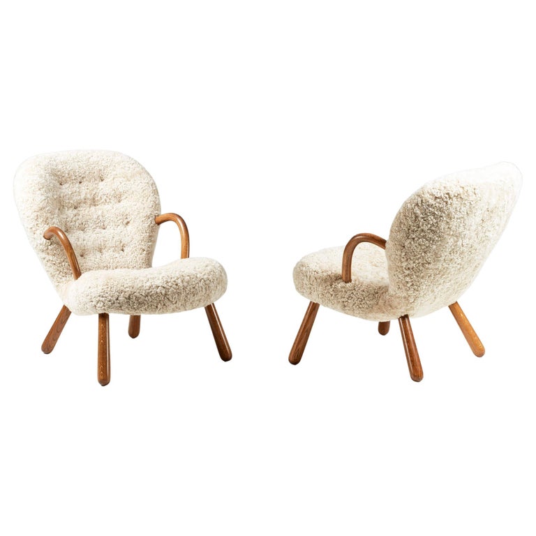 https://a.1stdibscdn.com/pair-of-arnold-madsen-sheepskin-clam-chairs-1944-for-sale/f_67442/f_288877121653951092540/f_28887712_1653951093331_bg_processed.jpg?width=768