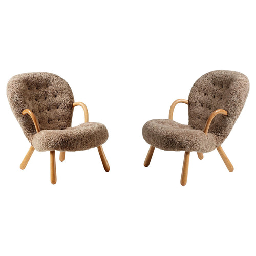 https://a.1stdibscdn.com/pair-of-arnold-madsen-sheepskin-clam-chairs-1944-for-sale/f_67442/f_288879221653951557521/f_28887922_1653951558186_bg_processed.jpg