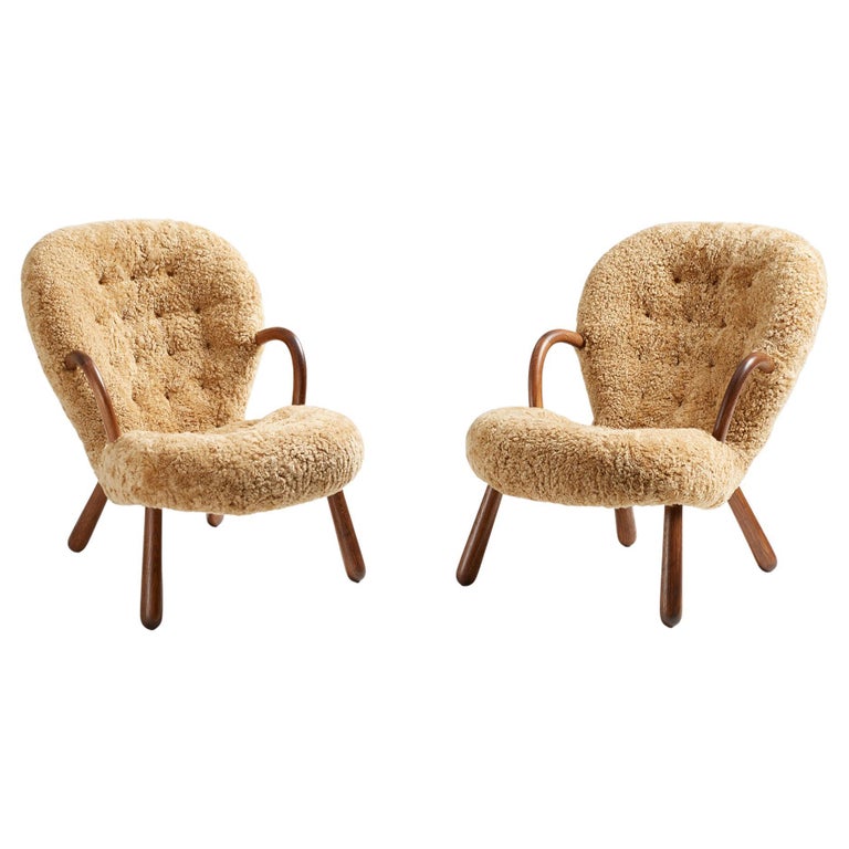 https://a.1stdibscdn.com/pair-of-arnold-madsen-sheepskin-clam-chairs-1944-for-sale/f_67442/f_288879921653951970200/f_28887992_1653951970812_bg_processed.jpg?width=768