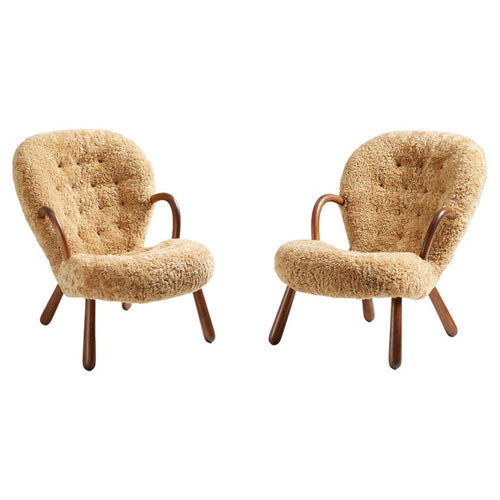 https://a.1stdibscdn.com/pair-of-arnold-madsen-sheepskin-clam-chairs-1944-for-sale/f_67442/f_288879921653951970200/f_28887992_1653951970812_bg_processed.jpg?width=768