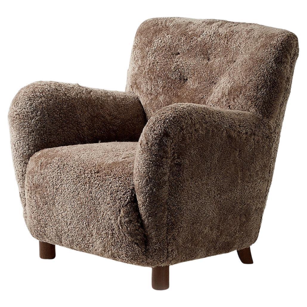 https://a.1stdibscdn.com/custom-made-model-54-sheepskin-lounge-chair-for-sale/f_67442/f_289404821654196354292/f_28940482_1654196354753_bg_processed.jpg