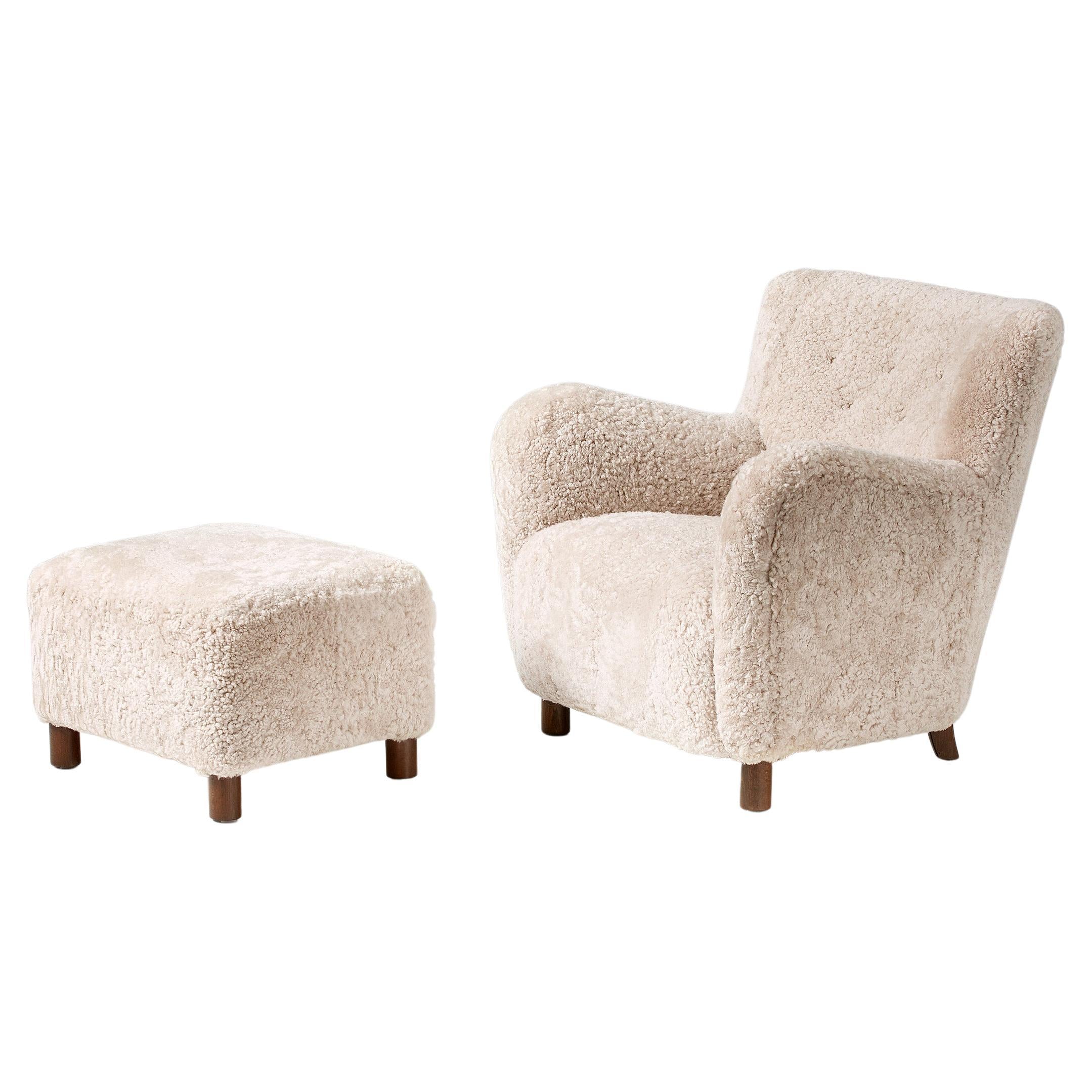 https://a.1stdibscdn.com/custom-made-model-54-sheepskin-lounge-chair-and-ottoman-for-sale/f_67442/f_289531721654269280542/f_28953172_1654269281199_bg_processed.jpg